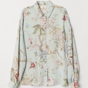 Pale green floral blouse